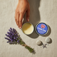 Overhead flat lay of LAVENDER CLOUD Hand Balm with aloe and almond oil, Indian woman's hands, fresh lavender flowers, bohemian spa aesthetic, natural skincare