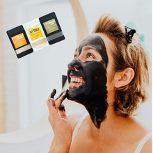 Woman using Mood Indigo's clay and rice powder face mask