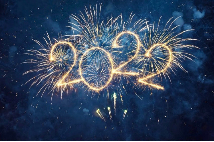2022 surrounded by fireworks for New Years