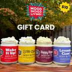 Four jars of Mood Indigo Living body butter with a gift card overlay on a wooden surface.