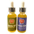 Two bottles of Mood Indigo natural face oil set with droppers on a white background.