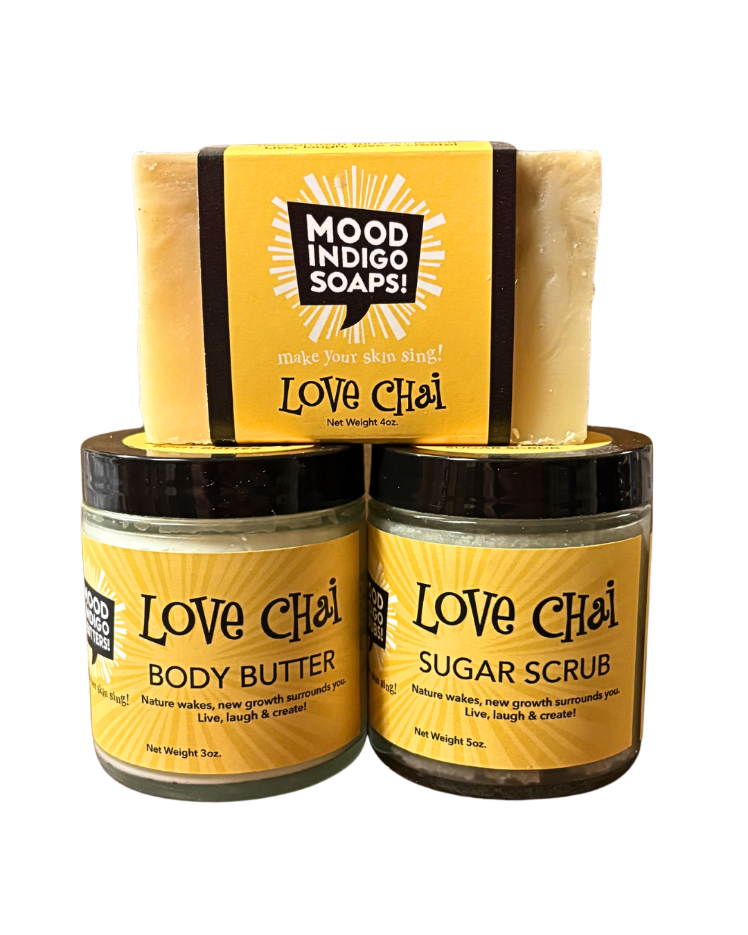 Mood Indigo Soaps Love Chai body butter, sugar scrub, and soap on a white background. Self-care routine