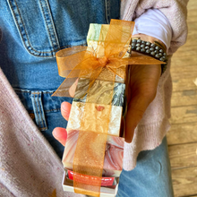 Close-up of Mood Indigo handcrafted mini soap texture and botanical details