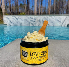 Moisturizing Lemongrass scented Love Chai Body Butter with scoop out by the pool