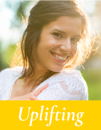 Woman with a smile on a yellow background with 'Uplifting' text. Uplifting collection by Mood indigo