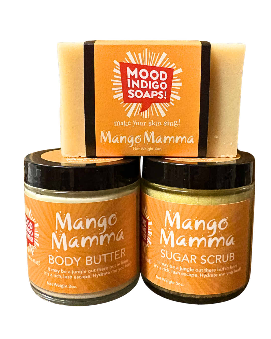 Mood Indigo Soaps Mango Mamma body butter, sugar scrub, and soap on a white background. Self care routine