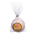 A bath bomb called 'Earthly Delight' with Sandalwood & Rosewood essential oils, wrapped in a clear plastic compostable packaging with a label showing the product name and the brand 'Mood Indigo Living'
