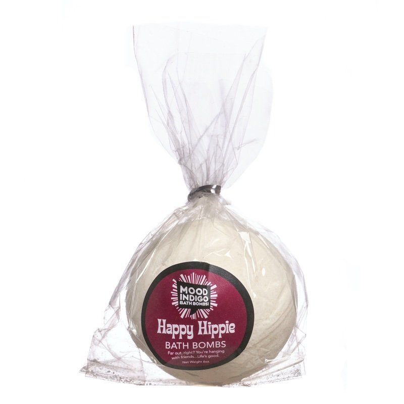 Moisturizing Patchouli Bath Bomb with essential oils in a compostable wrapper with a Mood Indigo logo and burgundy label that says Happy Hippie