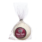Moisturizing Patchouli Bath Bomb with essential oils in a compostable wrapper with a Mood Indigo logo and burgundy label that says Happy Hippie